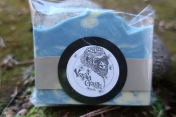 Blue/white swirl cedar, bergamot, rose & sandalwood cp soap bar, packaged in cellophane