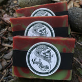 Three candy apple bars of soap with a vanilla gorilla logo on a natural background