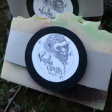 Two bars of soap with 'Vanilla Gorilla Soap Co.' labels on a grassy background