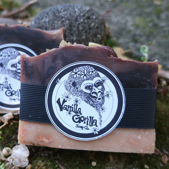 2 vanilla strawberry handmade soap bars with vanilla gorilla labels in a natural setting