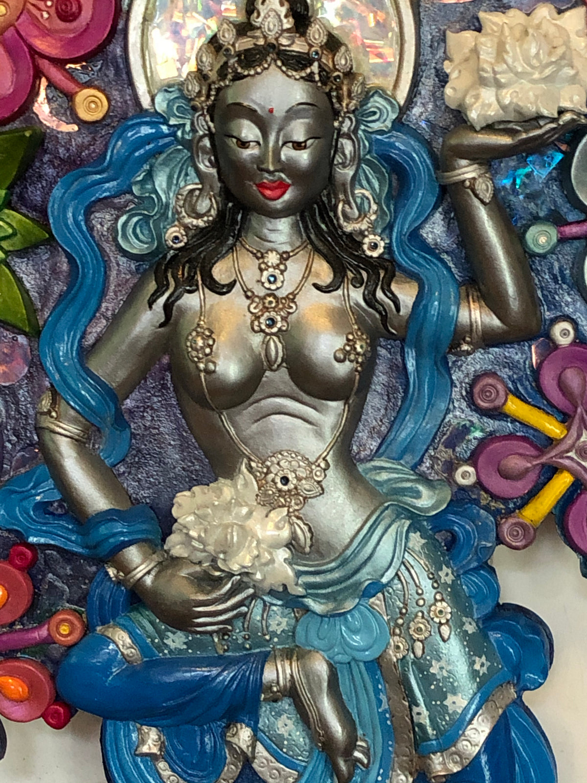 Silver Dakini in a sea of flowers 3dimensional art work Buddhist offering goddess