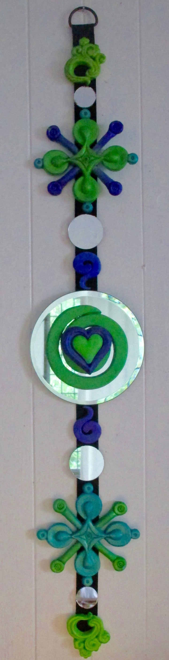 green & purple sculptural wall hanging art swirly heart on round mirror feng shui dangle