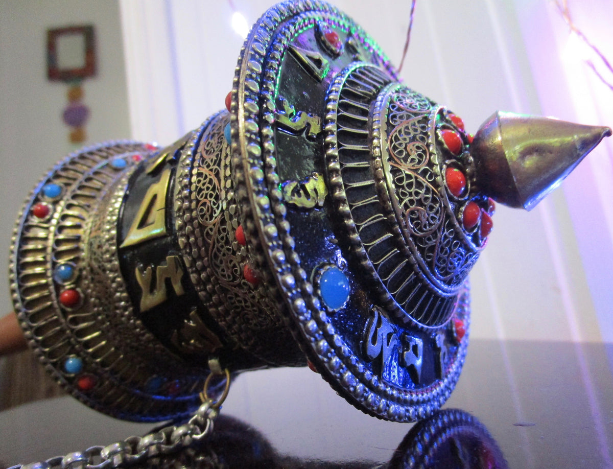 Nepali Handicrafts - Eyescape Design medium sized hand held prayer wheel