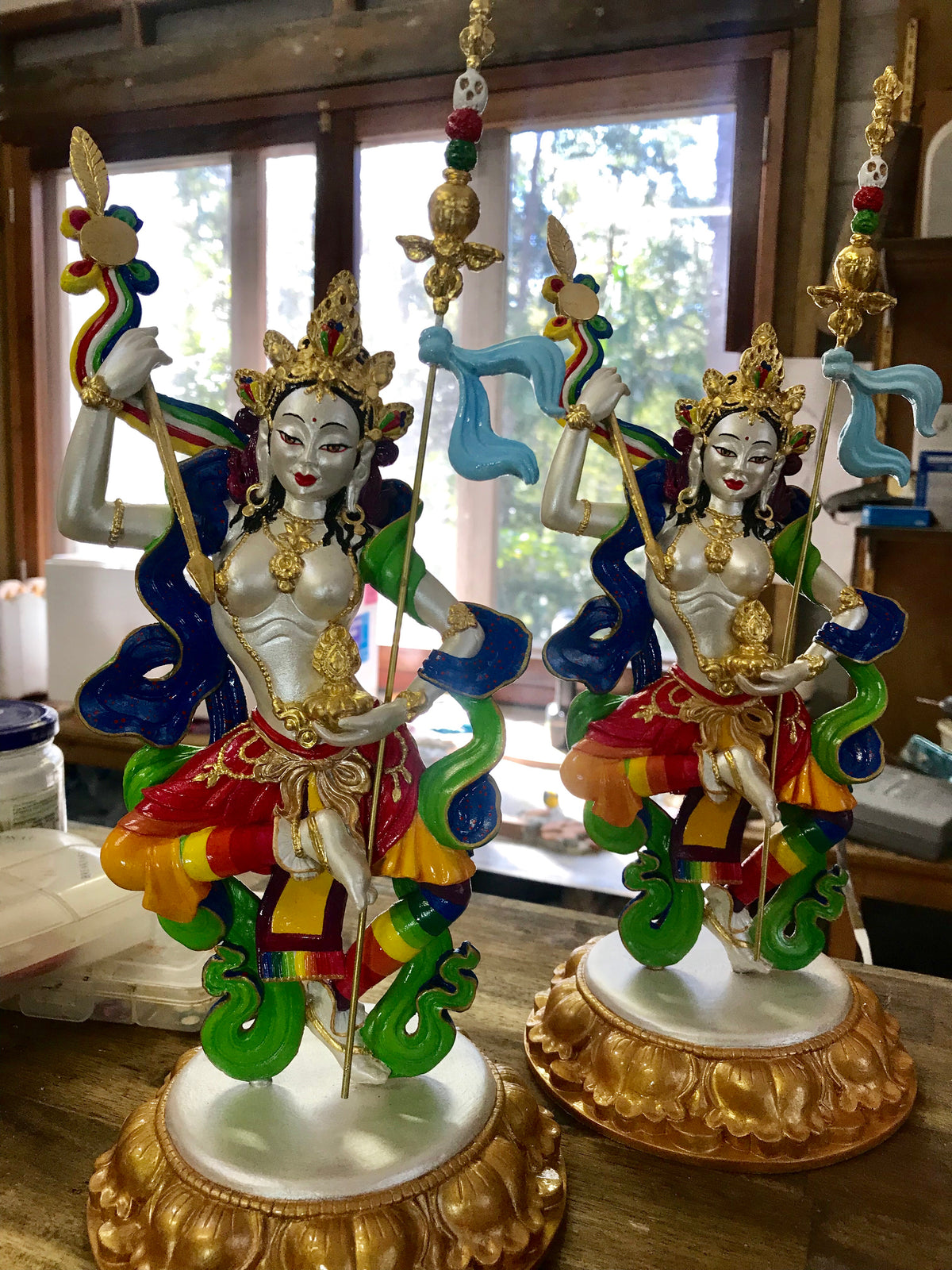 Two princess mandala a goddess statues multicoloured On gold lotus base